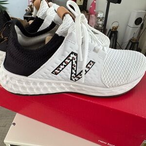 New Balance White and Black Athletic Shoes